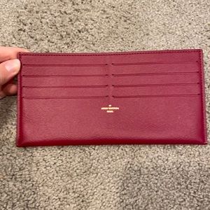 Authentic Louis Vuitton magenta Card and money insert wallet